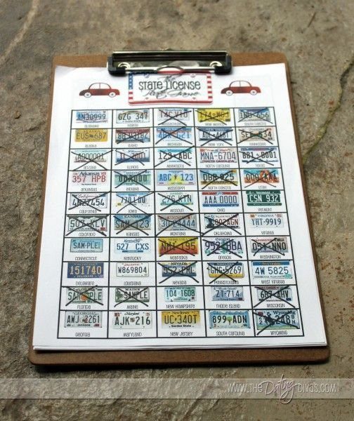 License plate bingo sheet on a clipboard with several plates crossed out.